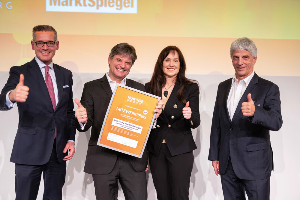 smic-Nuernberger-Unternehmer-Kongress-2023-Presse-Netzwerkpreis-Web-1000px-1 Netzwerkpreis geht an FAU-Präsidenten